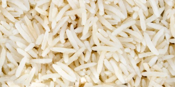 Close-up of cooked white rice grains.