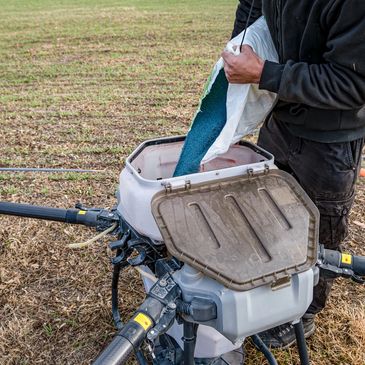 Filling a granular spreading drone