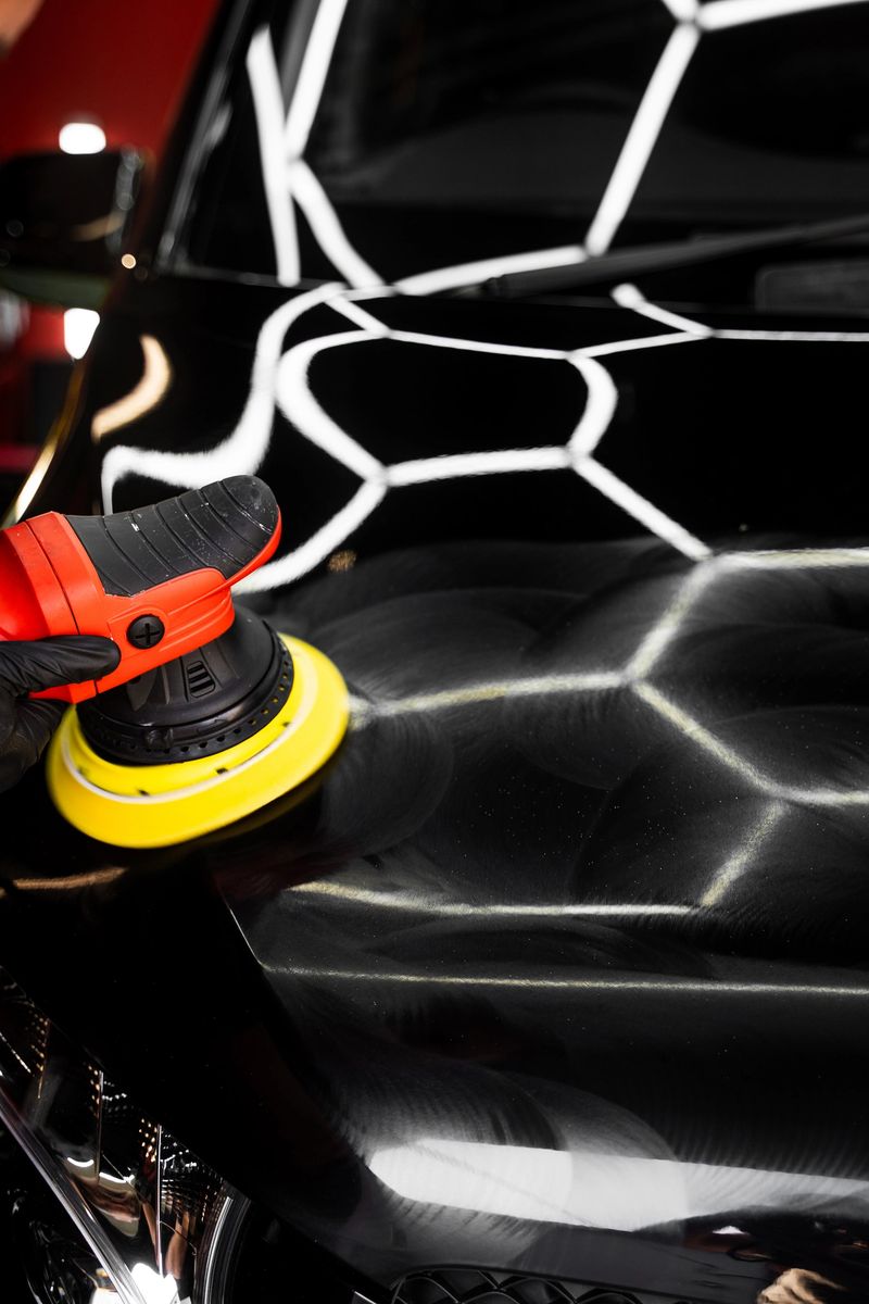 Car detailing polishing restores surface clarity and maximizes gloss. Machine buffing removes imperfections and boosts shine. Automotive polishing improves car surface reflection. Car Paint Polishing