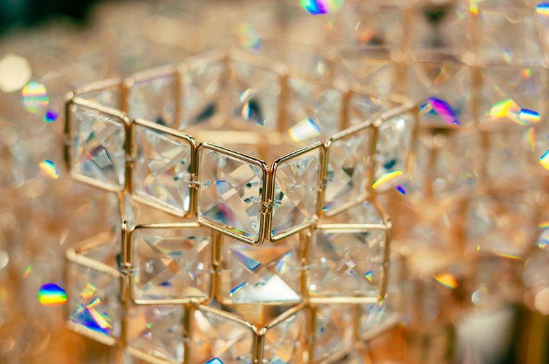 Close-up shot of a luxurious crystal object, showcasing intricate details and exquisite craftsmanship. Perfect for sophisticated designs.