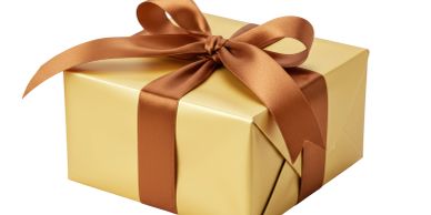 Gold gift box with brown ribbon
