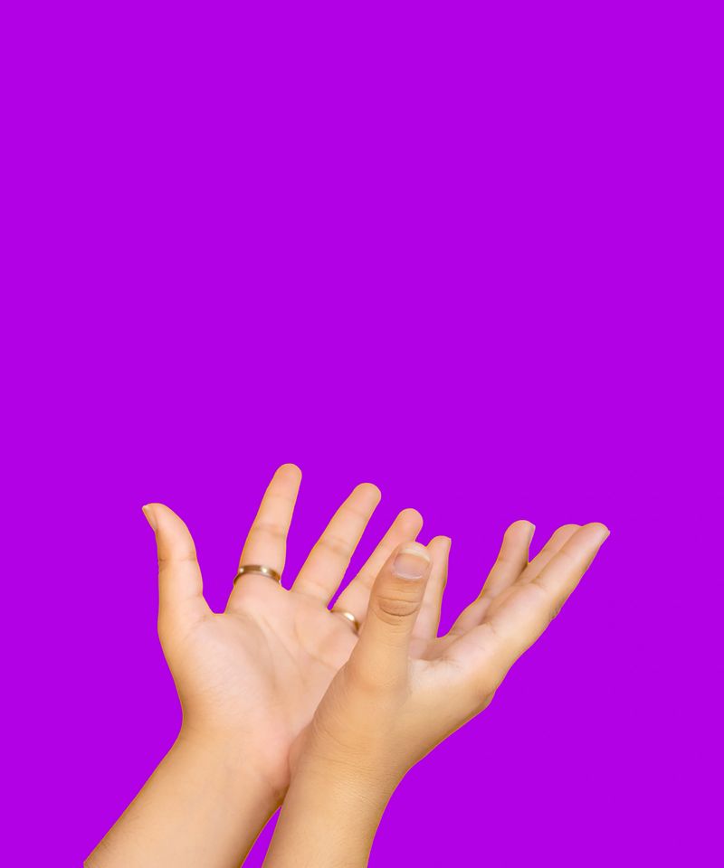 A hand captured in a symmetrical pose, centered for use in bold visual campaigns that emphasize product design, service features, or mobile experiences.