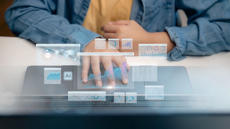 A user with AI-powered dashboard displaying data visualizations, representing business intelligence, predictive analytics, big data processing, machine learning insights, and smart decision-making.