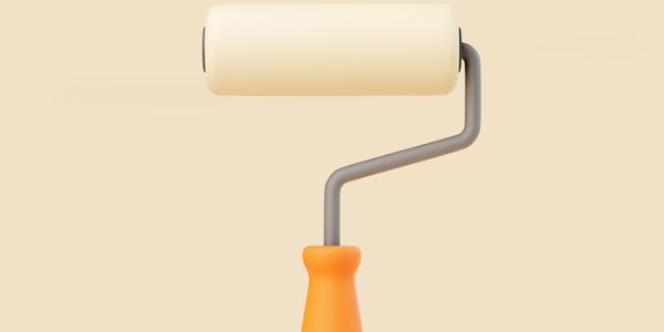 A paint roller with an orange handle and beige roller against a matching beige background.
