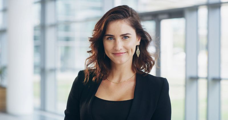 real estate agent, portrait and woman in office with smile for property development opportunity. Confidence, consultant or face of businesswoman in real estate, business management or professional in lobby