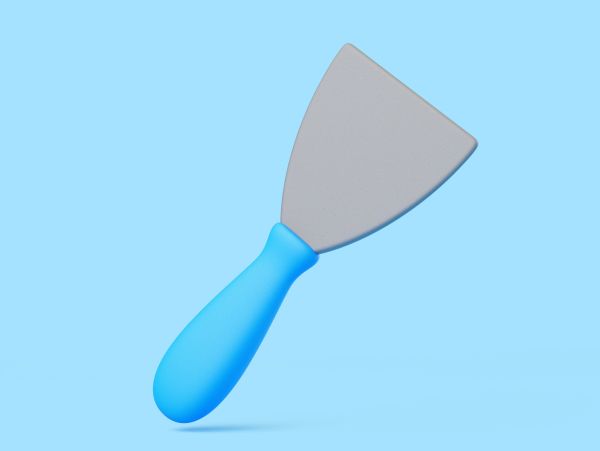 Blue-handled putty knife on a light blue background.