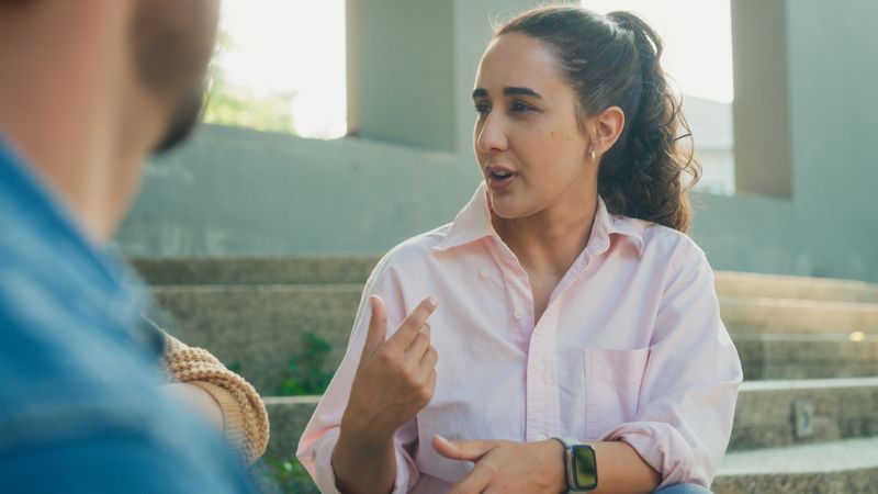 Diverse group of people participating in outdoor community therapy session focused on mental health awareness and support sharing advice to promote empathy togetherness. Mental health concept.