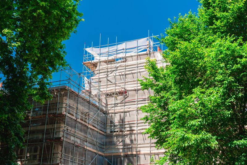 Scaffolding covers a building during renovation works in london