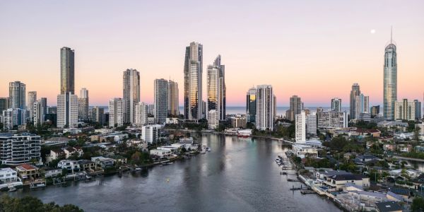 City skyline with river at sunset.
