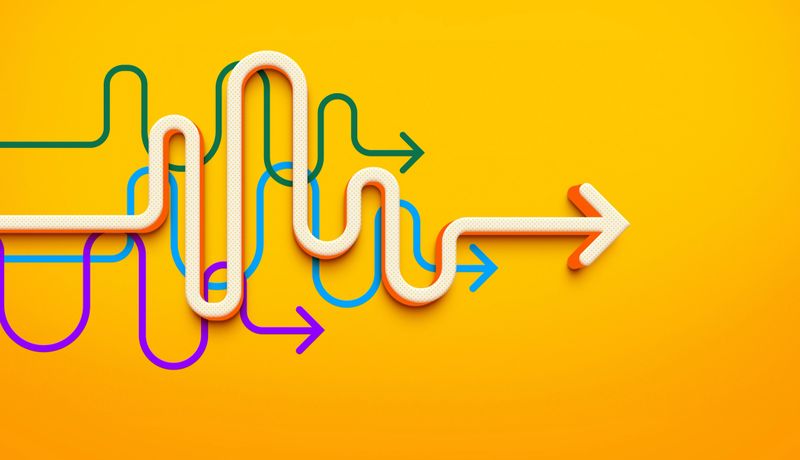 This 3D illustration powerfully visualizes the concept of finding a clear path through complexity. A primary white arrow navigates a tangled web of colorful, winding paths, ultimately pointing straight ahead. Set against a vibrant orange background, this image is a strong metaphor for strategy, problem-solving, and leadership. It represents the journey of simplifying a complex process to achieve a clear goal, making it ideal for business presentations on project management, innovation, and finding an effective solution.