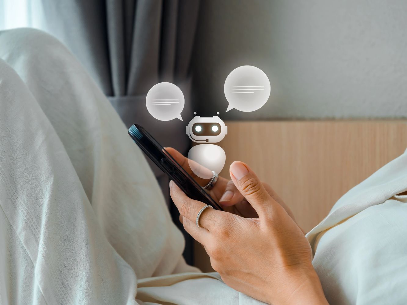 Person using a smartphone with a chatbot interface overlay.