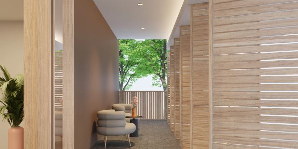 Modern hallway with wooden accents and cozy seating under soft lighting.
