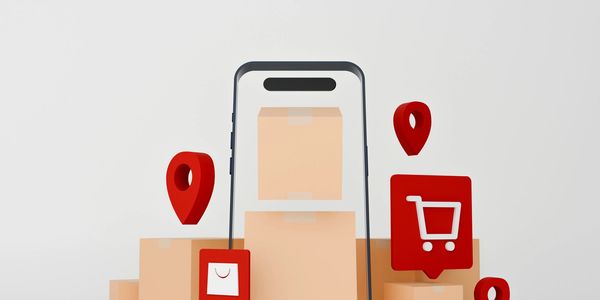 Online shopping concept with delivery boxes and mobile phone.