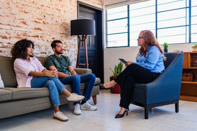 Couple in therapy with female counselor.