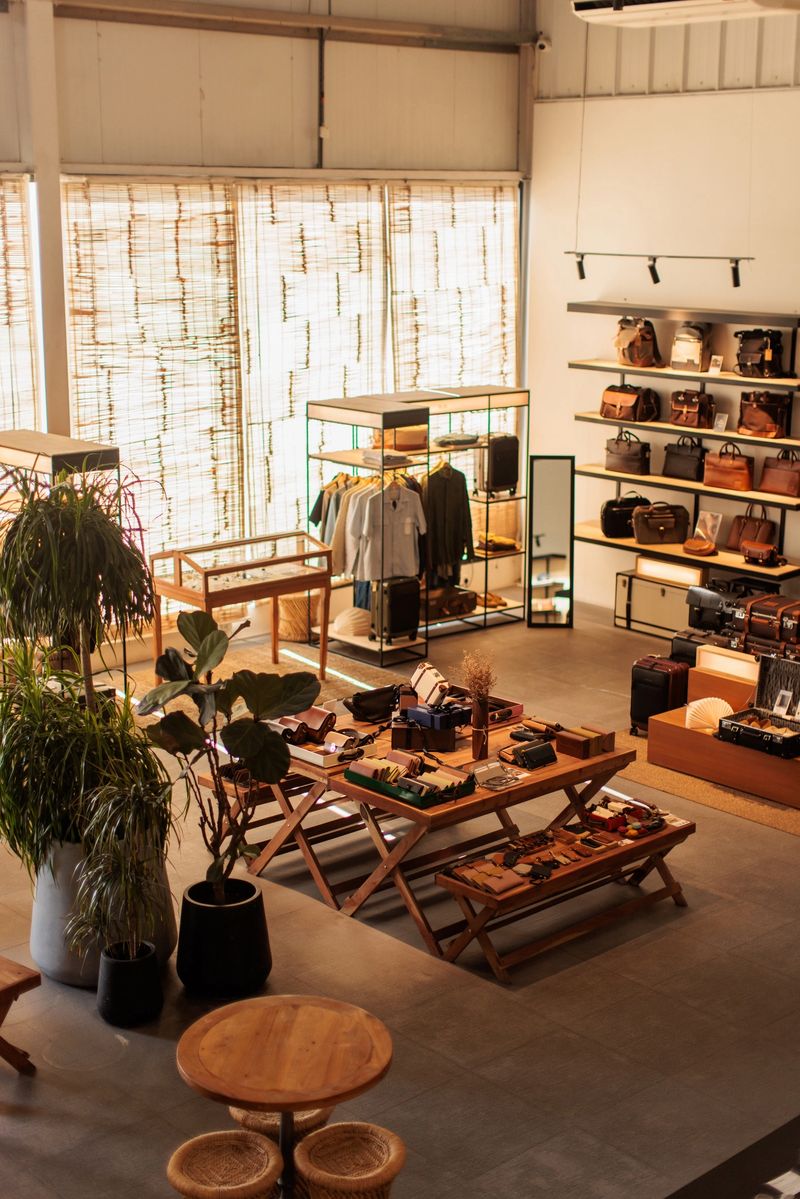 Sophisticated interior of a high-end boutique store in Dubai featuring designer clothing and accessories.