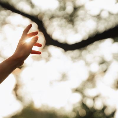 Spiritual figure radiating inner light.