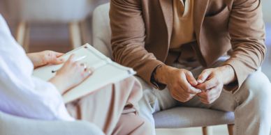 Therapist and patient in a counseling session.
