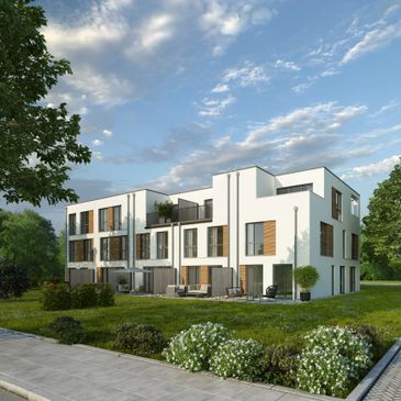 Modern white townhouse complex with wooden accents and lush green surroundings.