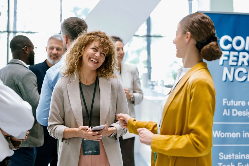 Group of Diverse Professionals Networking During a Business Event