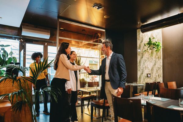 Industry professionals discussing plans.