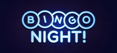 Neon sign reading "BINGO NIGHT!" on dark background.