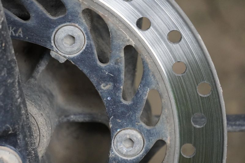 A close-up of a disc brake rotor, also known as a brake disc