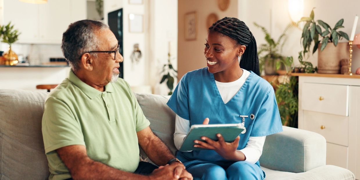 Nurse speaking with senior