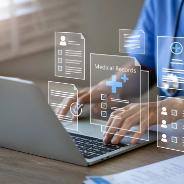 Person accessing digital medical records on laptop.