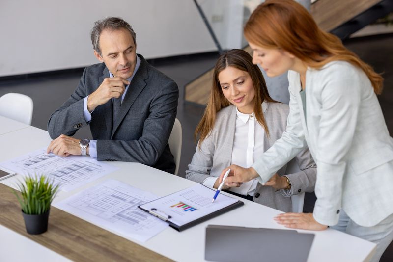 Business team discussing financial data in a modern office
