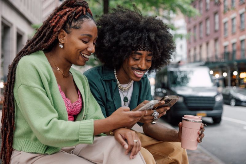 Couple of young generation Z friends in downtown New York enjoying a day together.