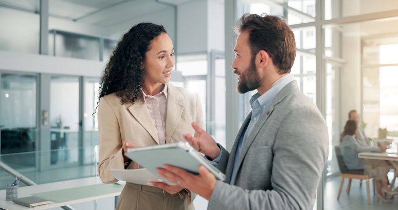 Business, documents and people with tablet for planning with revenue feedback, finance forecasting or teamwork. Financial analyst, office and digital report for investment analysis or risk assessment