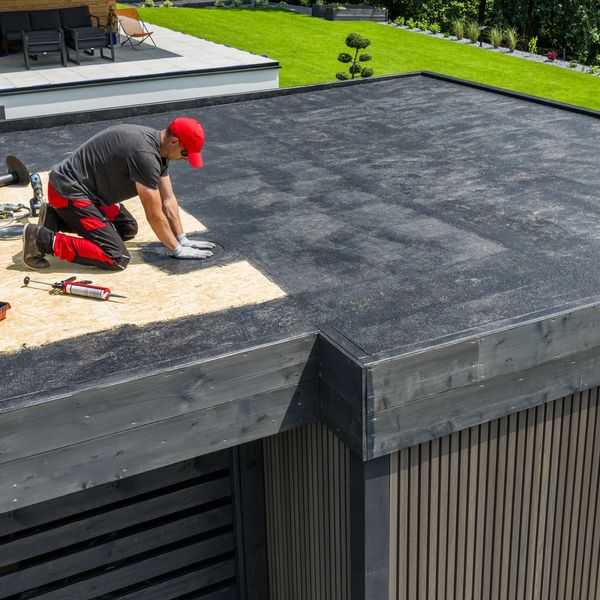 Commercial flat roof repair and restoration in Oklahoma for professional business properties.