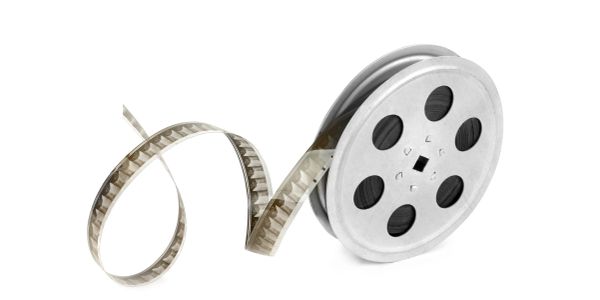 A film reel with partially unwound filmstrip.