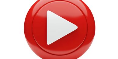 Red circular play button with white triangle.