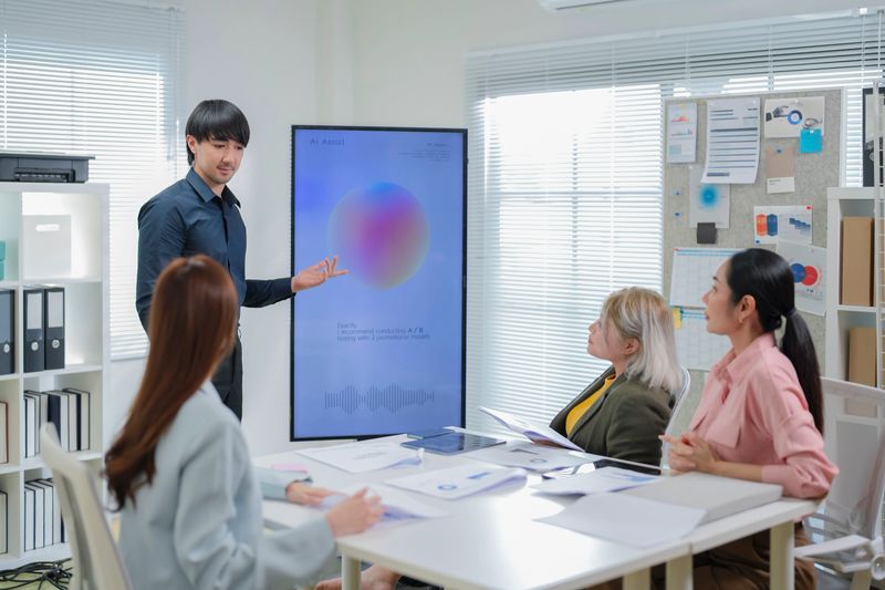 Business team brainstorming session on innovation and strategy, powered by AI meeting assistants that streamline collaboration, automate action item creation, and deliver real-time meeting insights