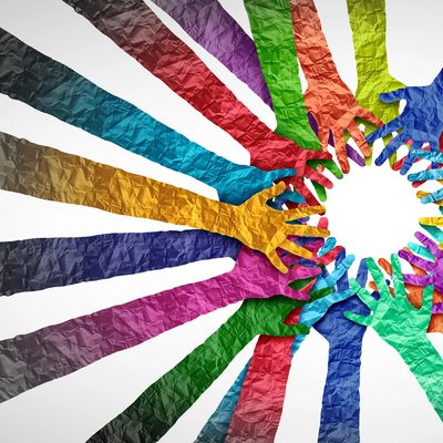 Colorful paper hands arranged in a circle, symbolizing unity and diversity.