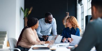 Team members collaborating in a modern office.