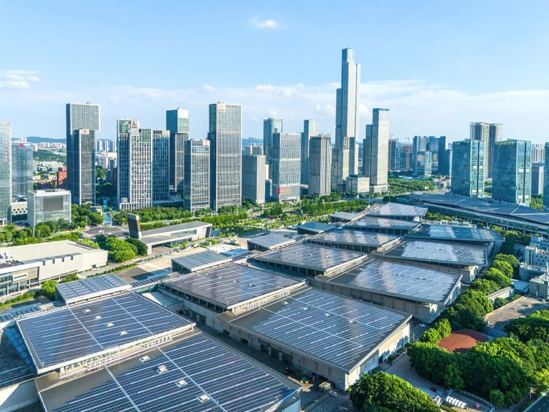 Innovative solar panels installed on a modern building roof in California.