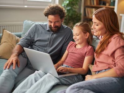 Family spending time together looking for birthday ideas.