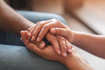 Grief Counseling hand holding Roffina Psychotherapy