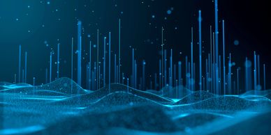 Digital blue data streams rising from a virtual landscape.