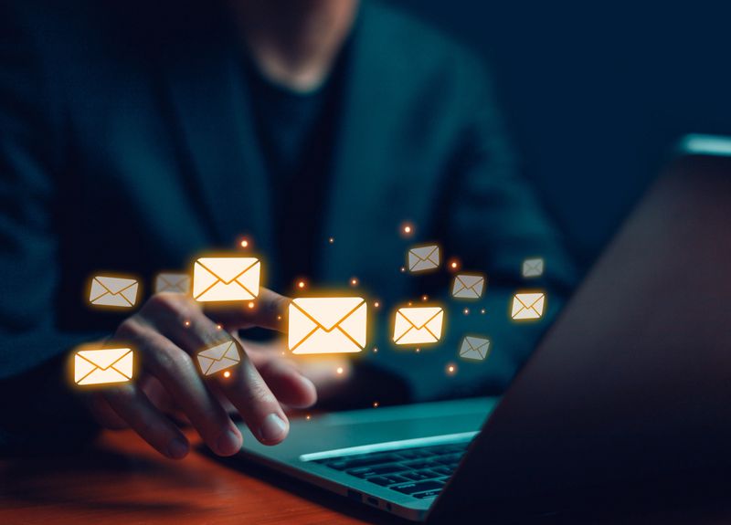 Business email uses technology to send messages, has a mailbox, uses marketing, works on icons, delivers on computers and digital networks, and has a communication channel for receiving newsletters.