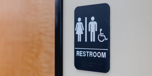 ADA accessible restroom sign for a commercial ADA compliance upgrade in Tampa
