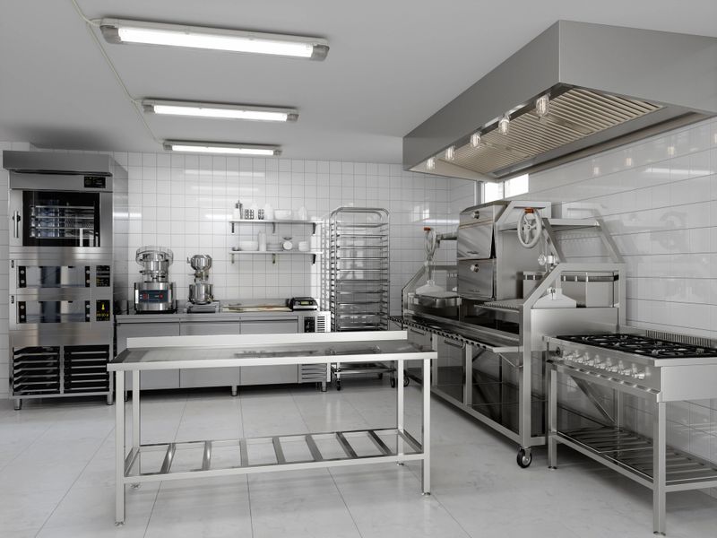 Modern Commercial Kitchen With Industrial Appliances And Equipments