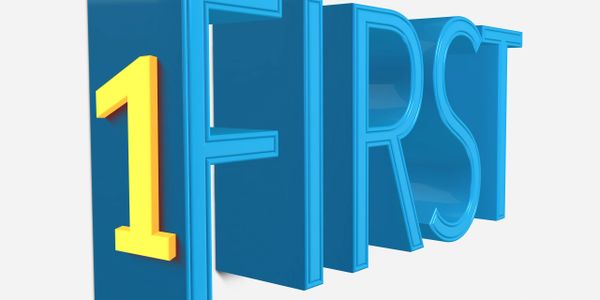 3D text with a yellow '1' and blue letters spelling 'FIRST'.