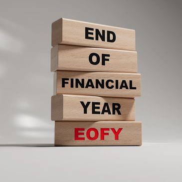 Wooden blocks stacked with 'End of Financial Year EOFY' text.