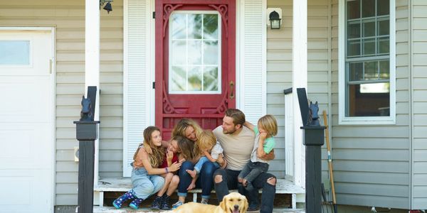 Family safe at home on front porch. Make America safe. National security. 