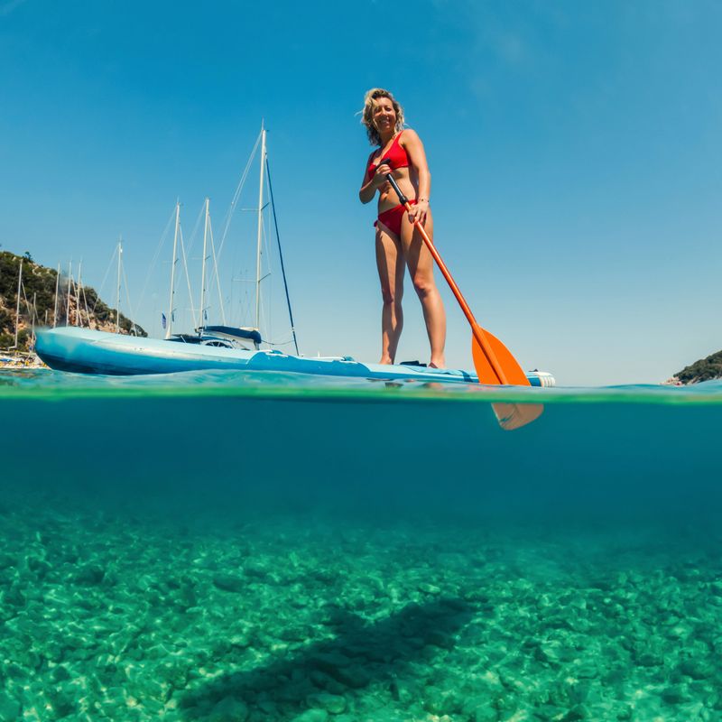 Woman paddling on a stand-up paddleboard