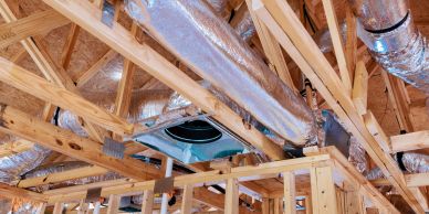 HVAC system installation in wooden framework.