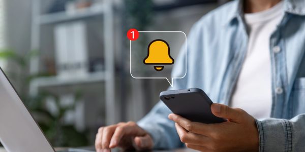Person checking a smartphone notification.